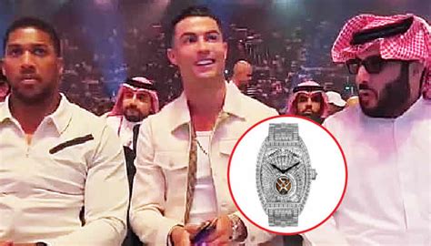 Ronaldo shows off £1.4m diamond watch during Usyk, Fury fight